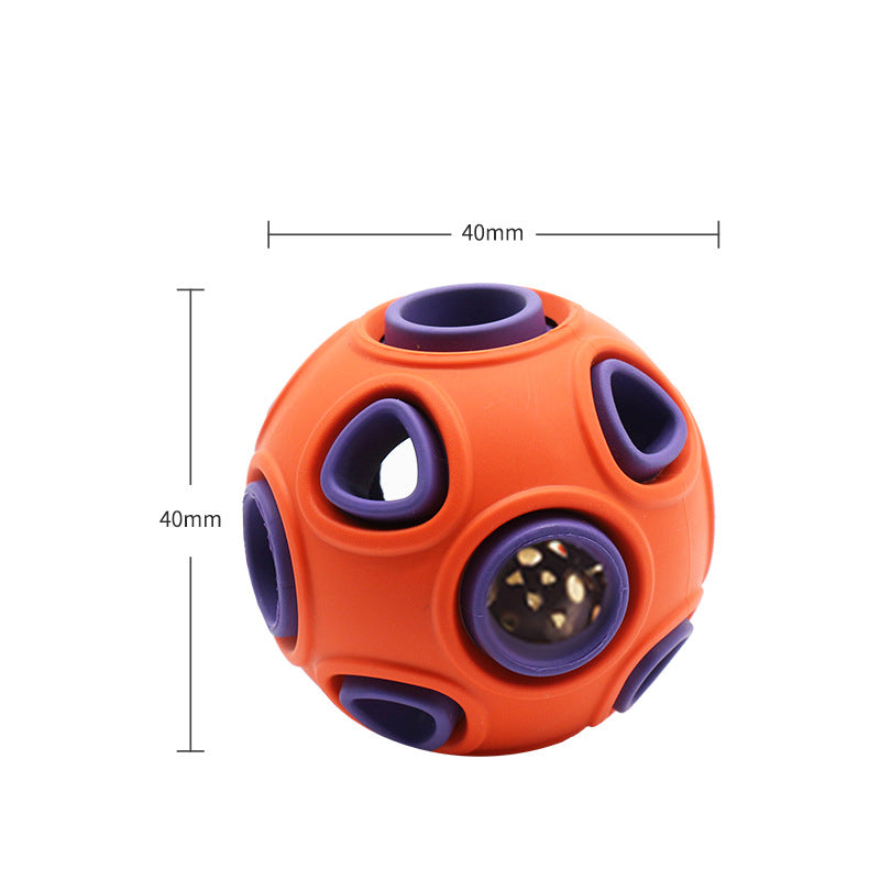 Illuminated Glow-in-the-Dark Squeaky Dog Ball glowing brightly in dark grass