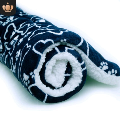 Soft fleece pet blanket folded for travel and crate use