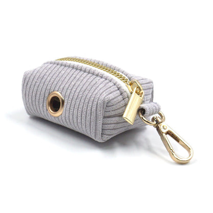 Compact corduroy baby blue pouch for carrying dog waste bags on walks