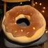 Donut plush cushion in purple taro pet bed for indoor pet.