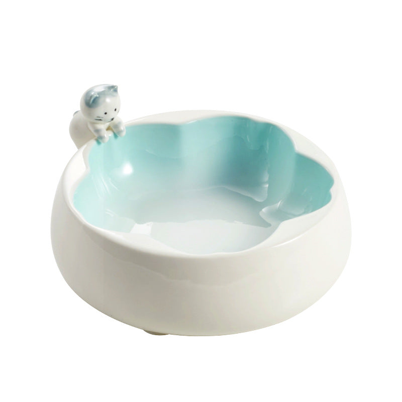Hand-glazed and painted blue Sakura ceramic bowl for cats feeding.