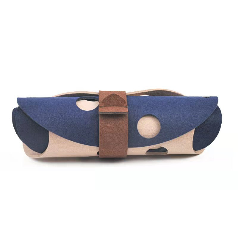 Modular felt cat tunnel with peek-a-boo cutouts and metal snaps, shown as a play tunnel and hideout bed