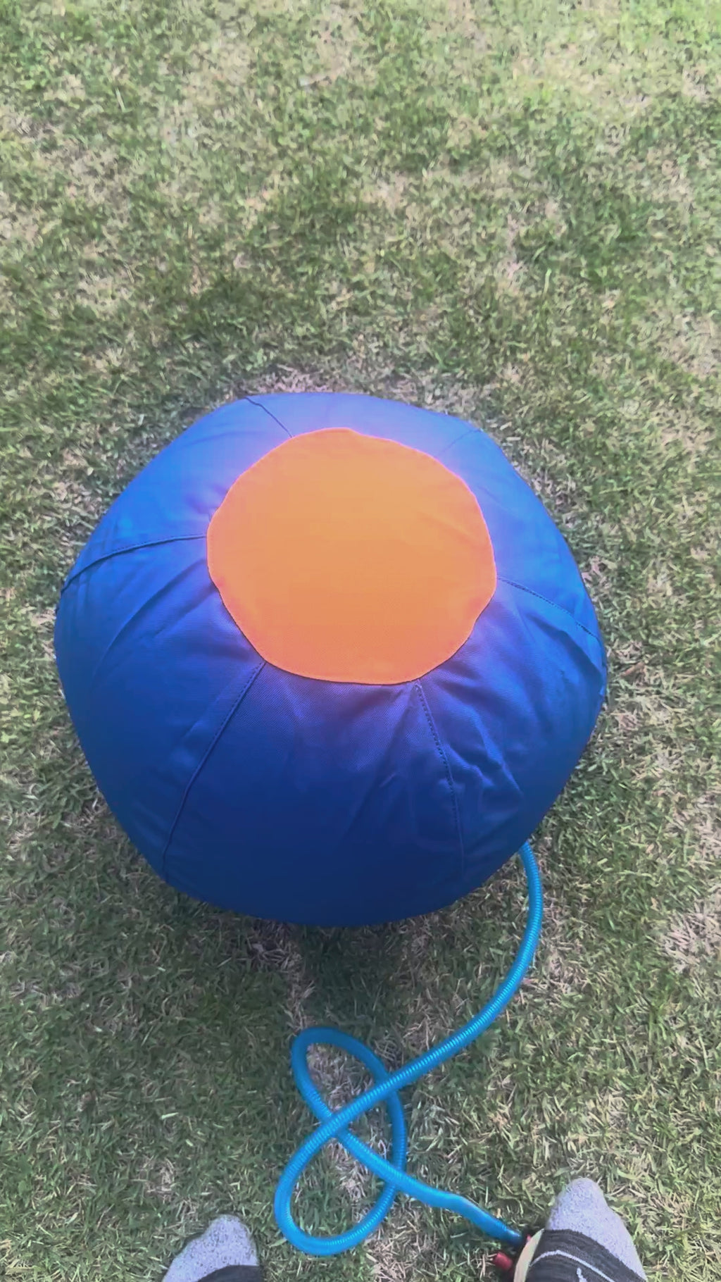 Inflating the OG Herding Ball with the included hand pump